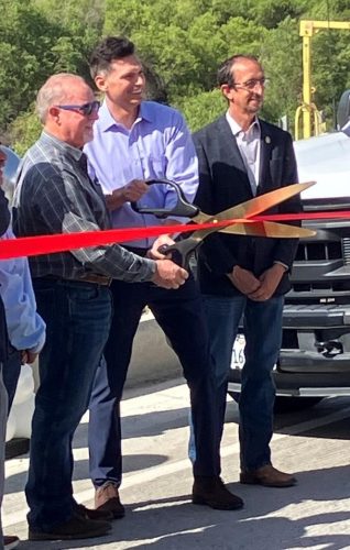 2 Hills Ferry Ribbon Cutting Placing the Scissors
